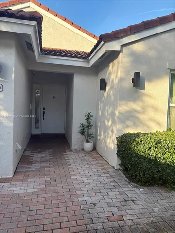 a view of a swimming pool and lounge chair