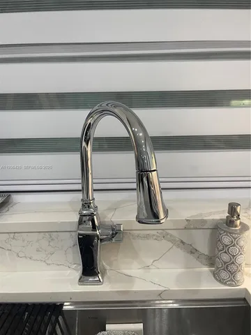 a kitchen with a stove and a microwave