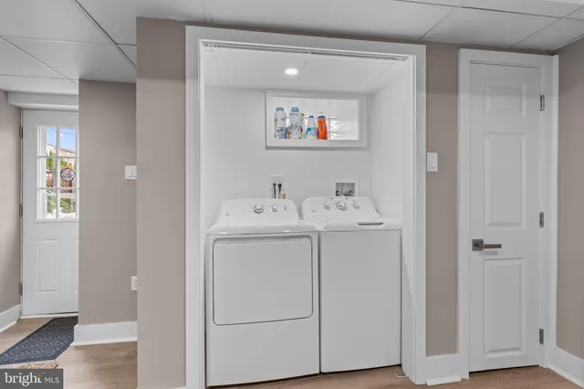 a utility room with dryer and washer