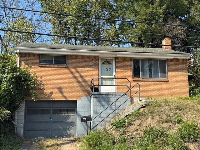 a view of a balcony with table and chairs