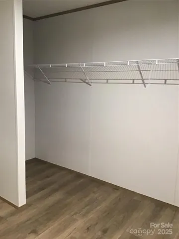 a view of a room with racks on the wall