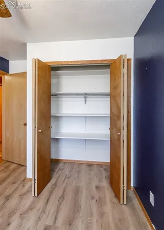 an empty room with closet