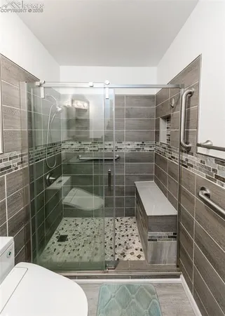 a view of a house with large windows