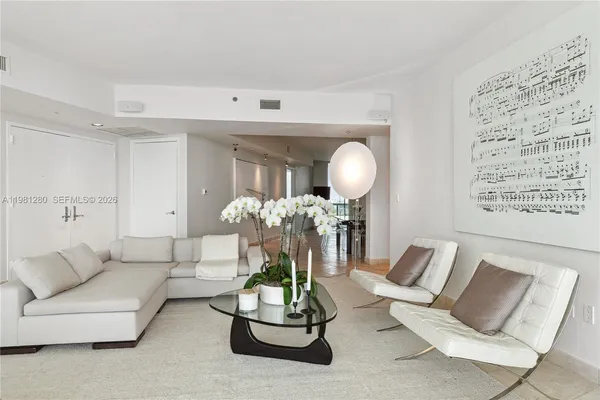 a kitchen with stainless steel appliances granite countertop a refrigerator stove and a sink