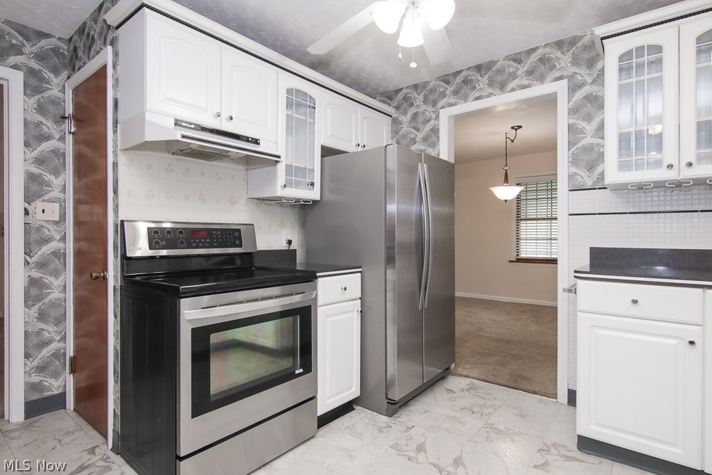 2337 North Taylor Road Cleveland, OH 44112 - Photo 11 of 34 Gas stove, double door fridge and pantry. This kitchen has everything.