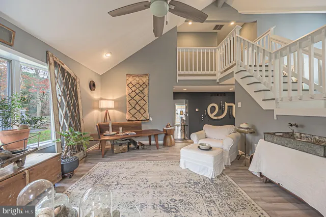 a living room with furniture or couch and a window