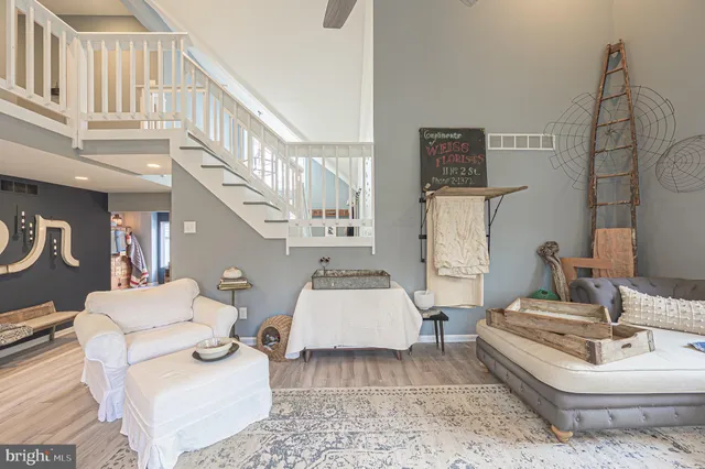 a living room with furniture and a couch