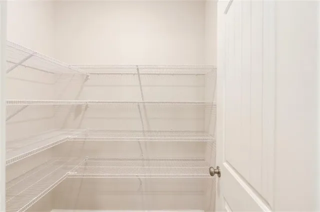 a view of a room with racks on the wall