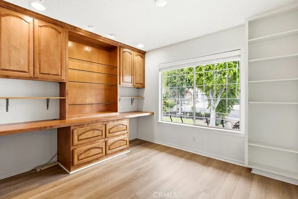 a room with window and furniture