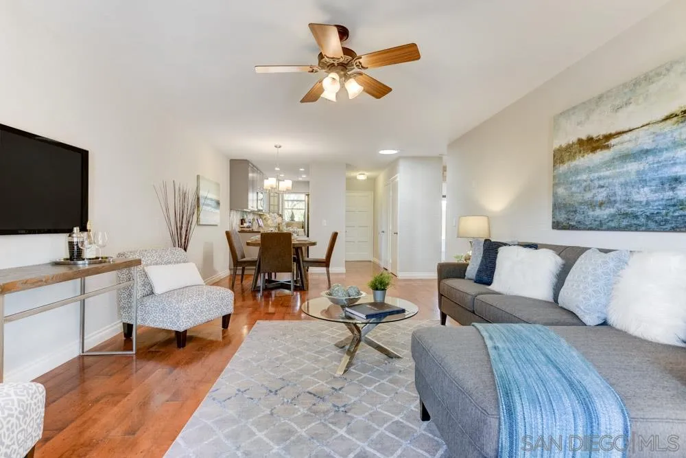 1750 Charleston Lane Encinitas, CA 92024 - Photo 2 of 25 a living room with furniture and a flat screen tv
