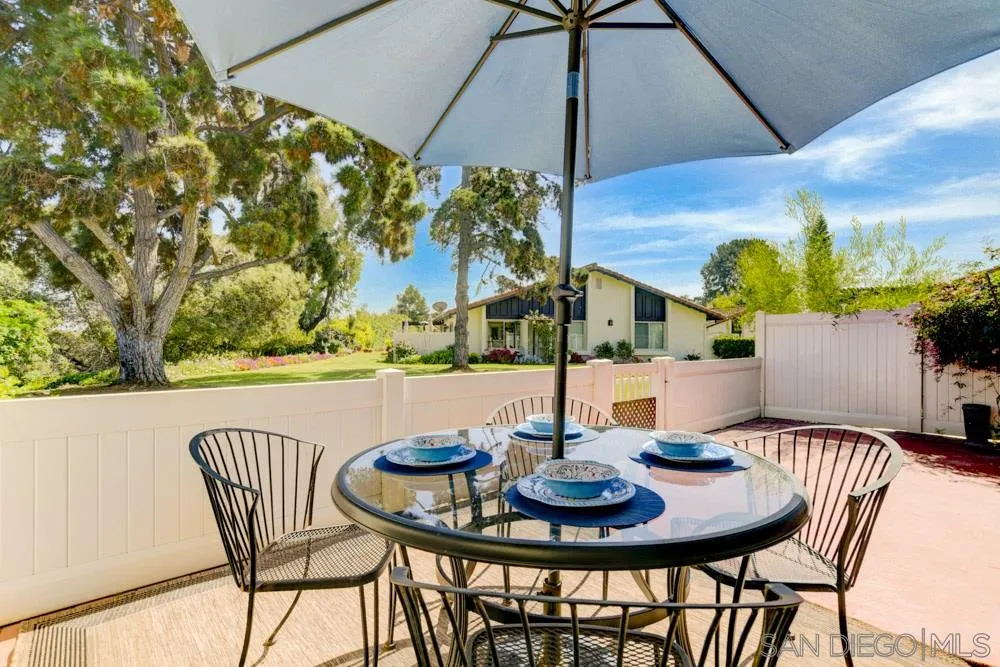 1750 Charleston Lane Encinitas, CA 92024 - Photo 21 of 25 a table and chairs in the patio
