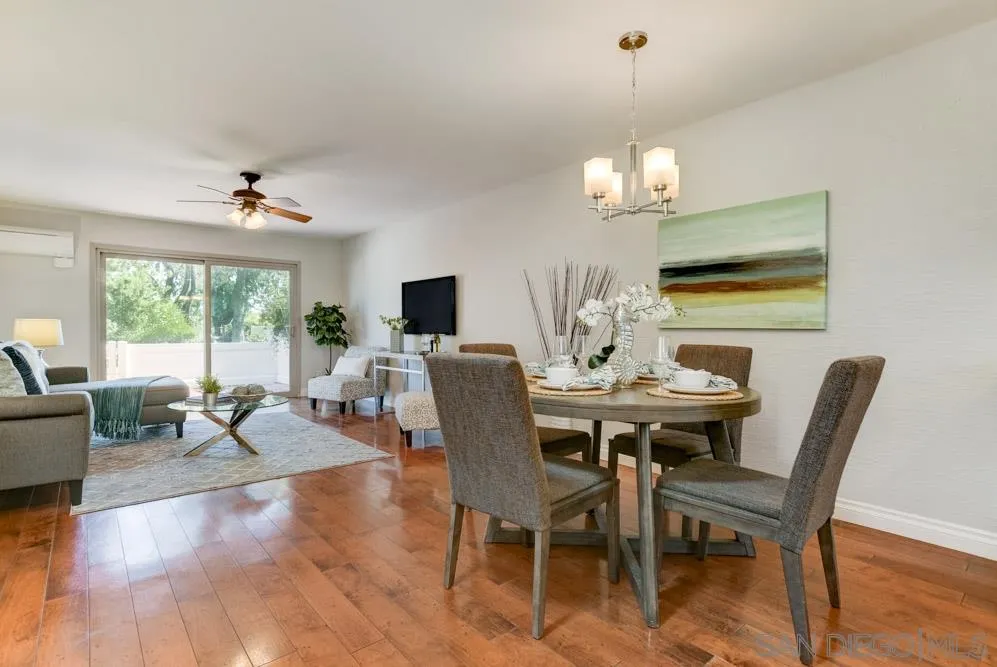 1750 Charleston Lane Encinitas, CA 92024 - Photo 6 of 25 a view of a dining room with furniture window and wooden floor