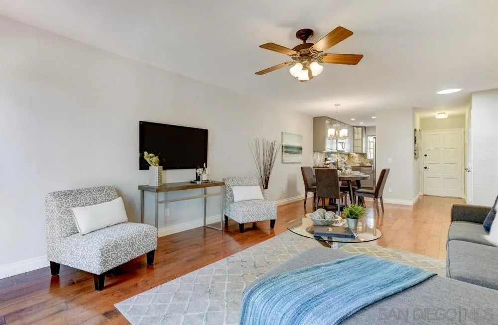 1750 Charleston Lane Encinitas, CA 92024 - Photo 7 of 25 a living room with furniture and a flat screen tv with wooden floor