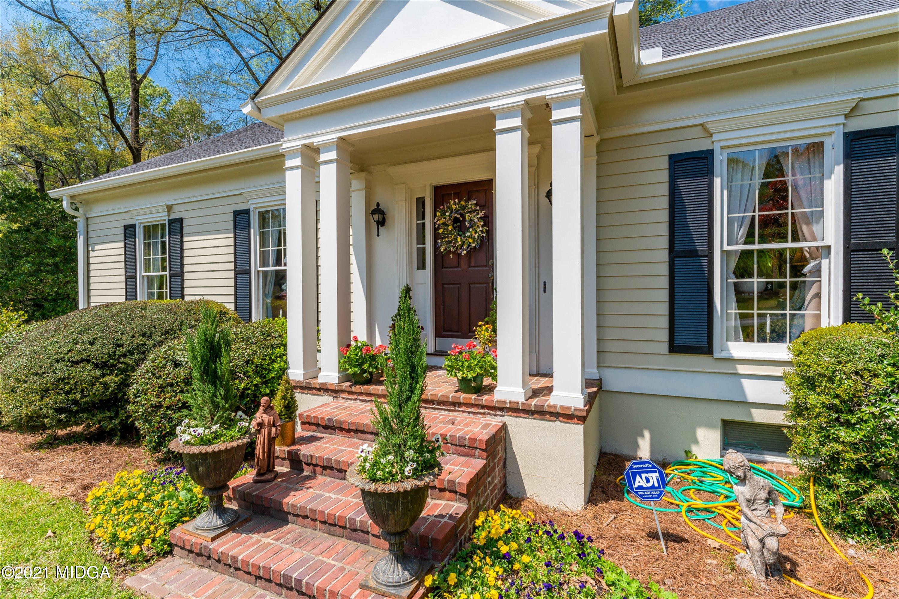 1946 Wood Valley Road Macon, GA 31211 - Photo 2 of 35 a front view of a house with an outdoor space