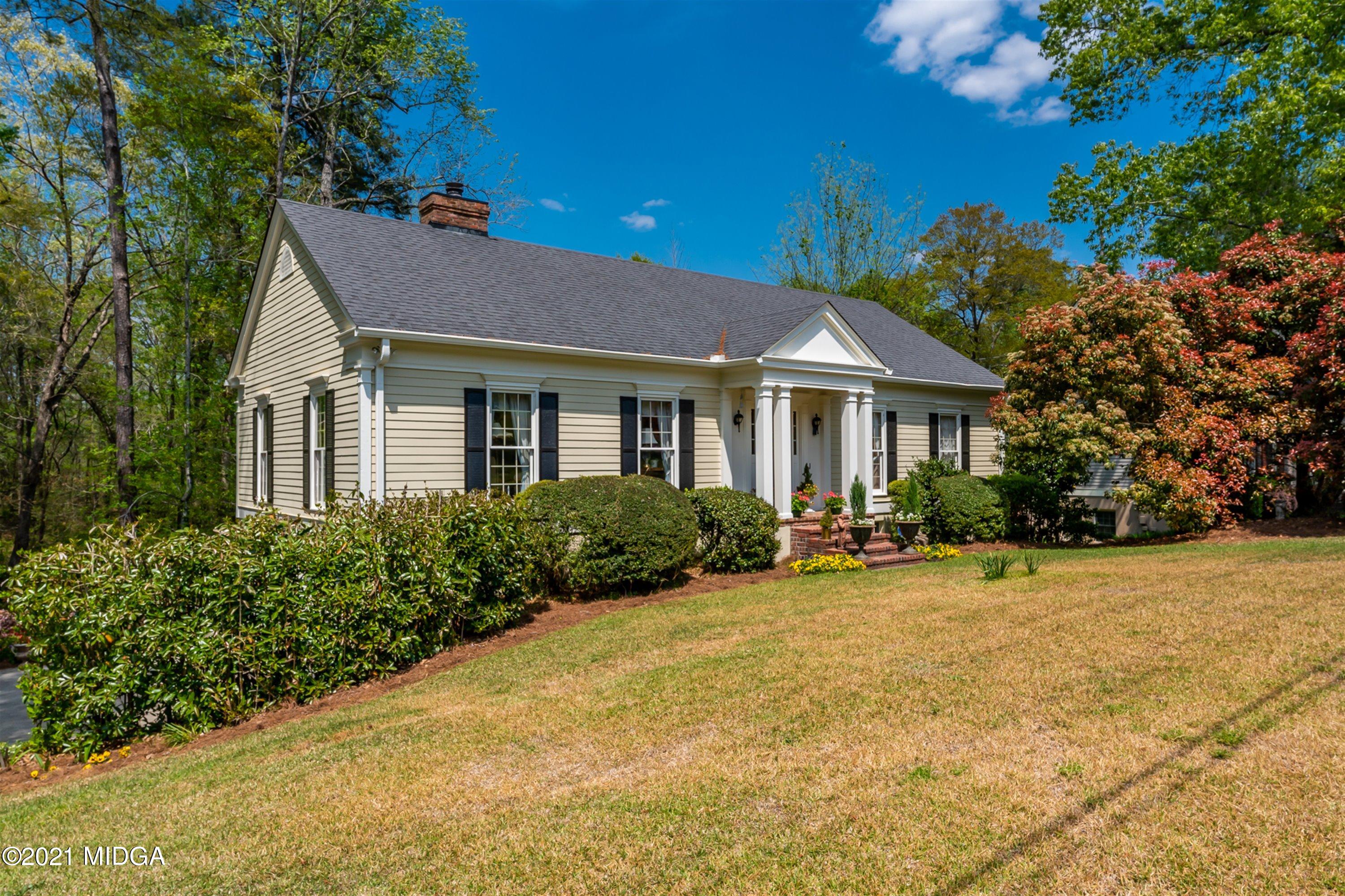 1946 Wood Valley Road Macon, GA 31211 - Photo 3 of 35 a front view of a house with yard and green space