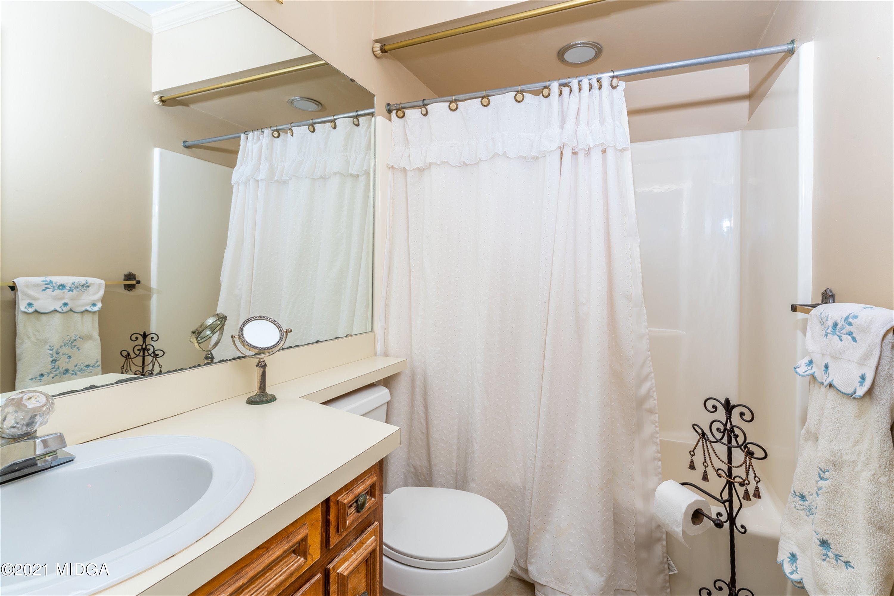 1946 Wood Valley Road Macon, GA 31211 - Photo 25 of 35 a bathroom with a sink toilet and shower