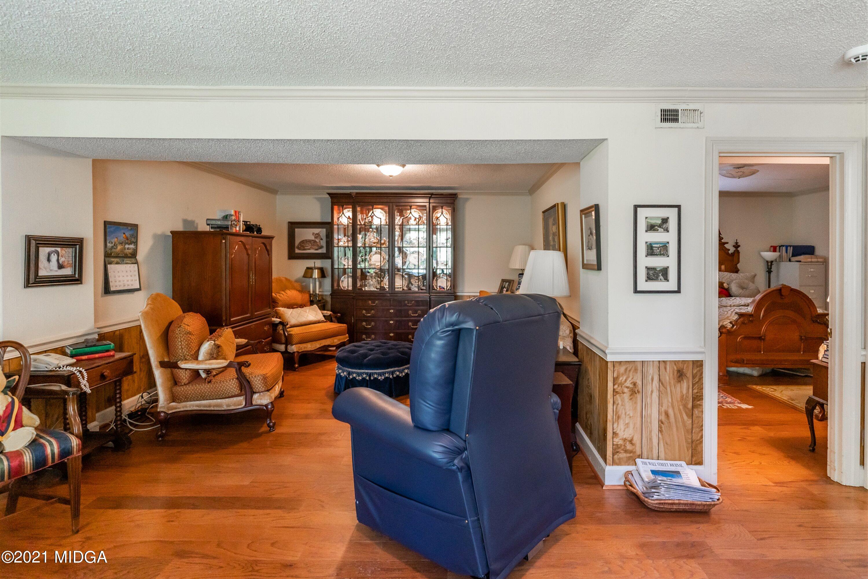 1946 Wood Valley Road Macon, GA 31211 - Photo 29 of 35 a living room with furniture and a flat screen tv