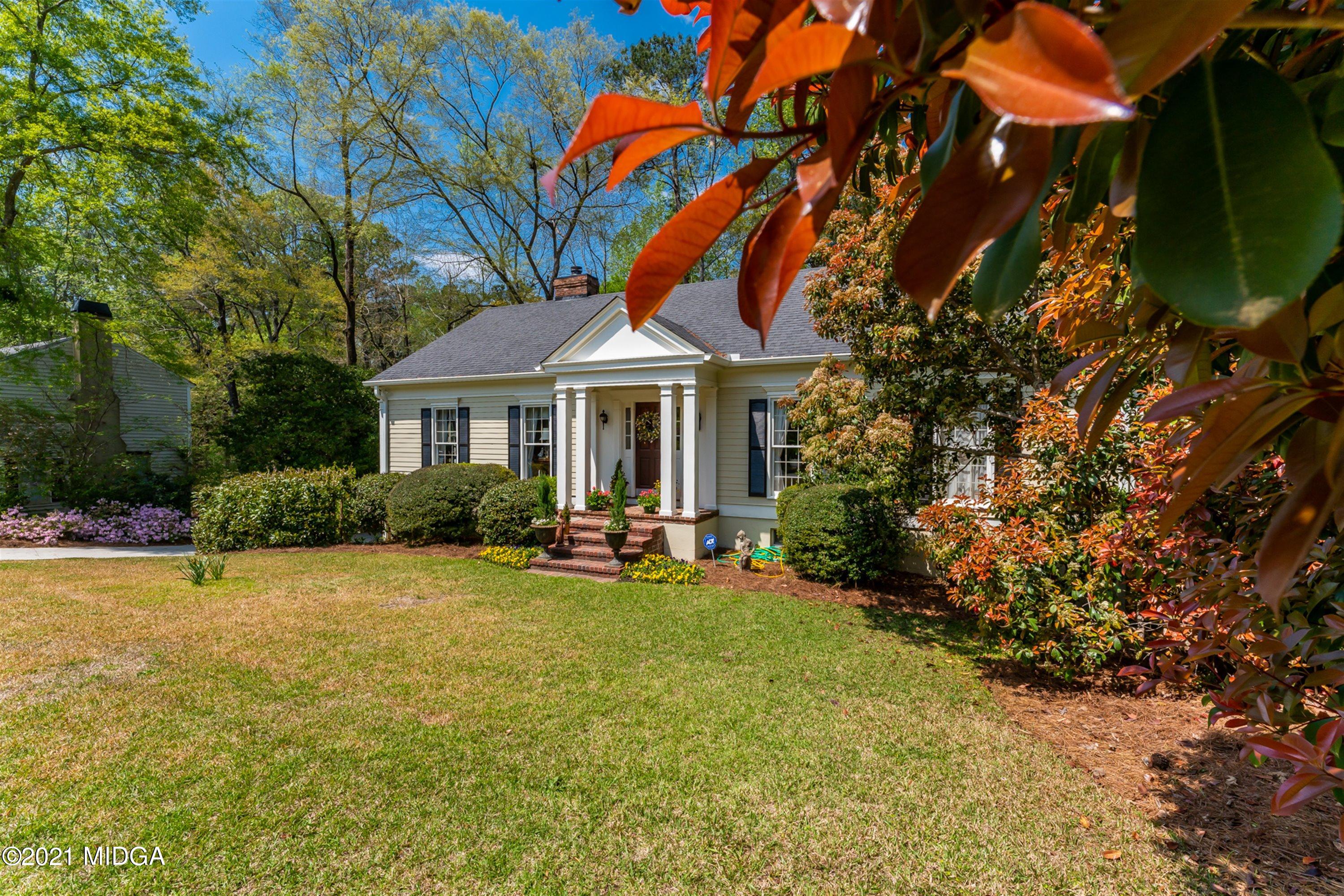 1946 Wood Valley Road Macon, GA 31211 - Photo 4 of 35 a front view of a house with patio and garden