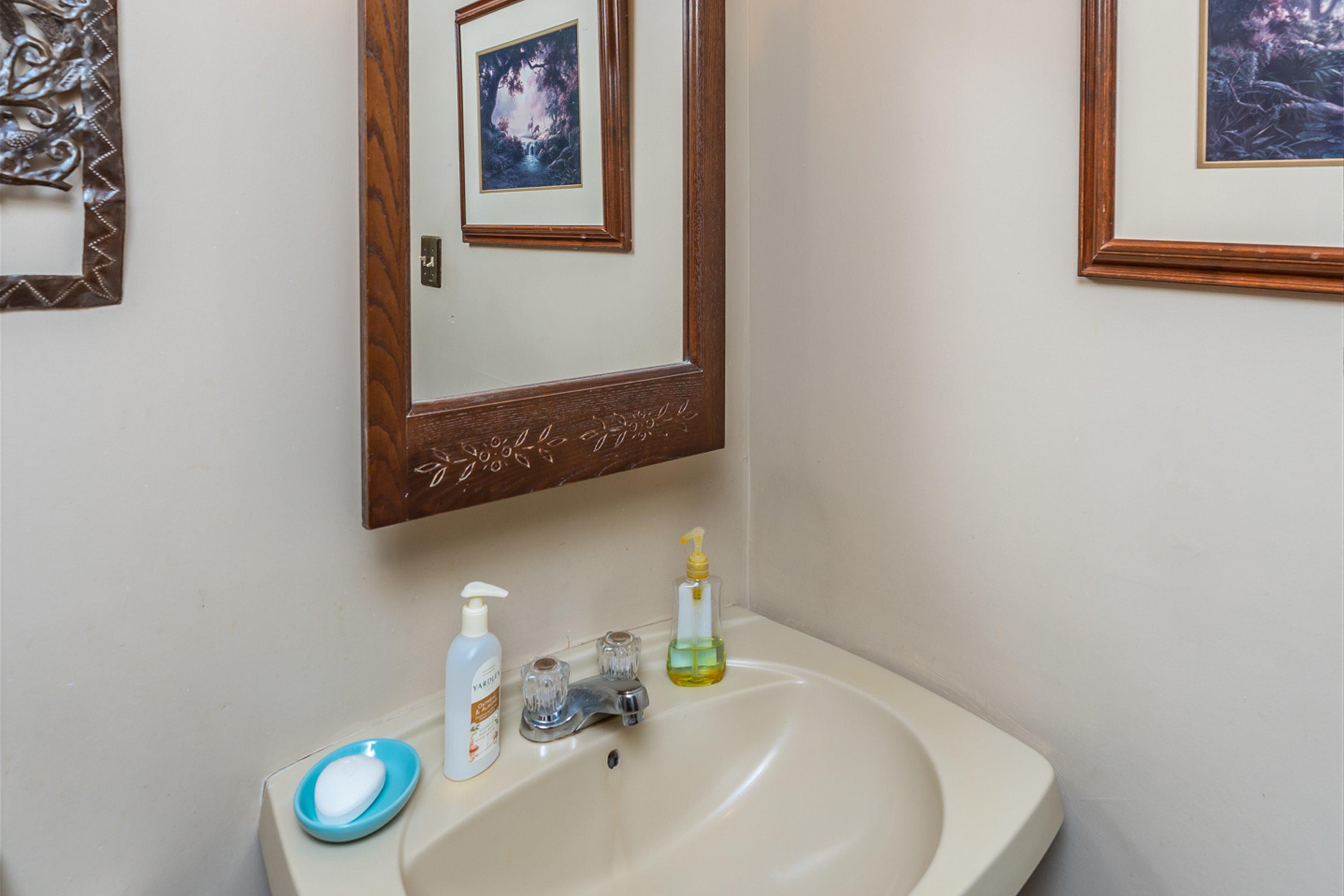 1946 Wood Valley Road Macon, GA 31211 - Photo 31 of 35 a bathroom with a sink and a mirror