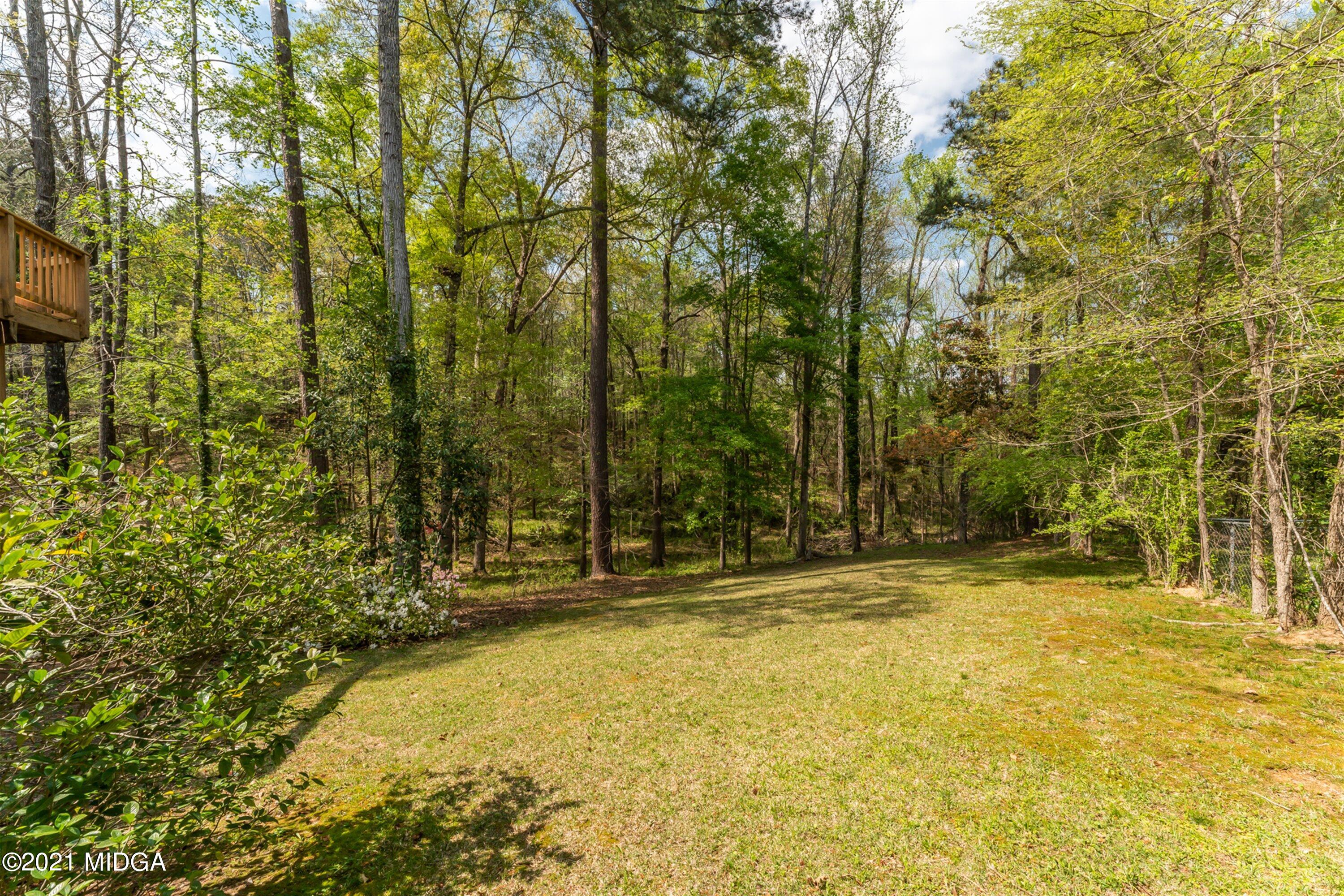1946 Wood Valley Road Macon, GA 31211 - Photo 32 of 35 a view of swimming pool with trees in front of house