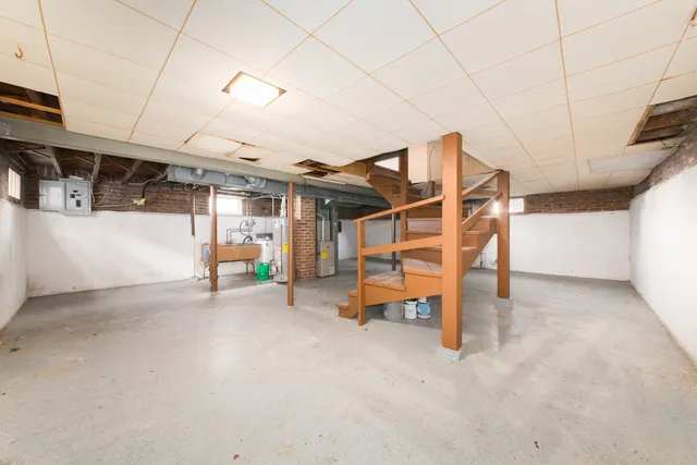 a view of a room with wooden walls