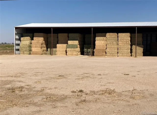 a front view of a house with parking