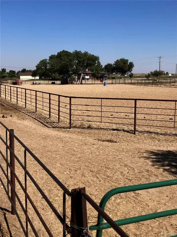 a view of swimming pool with furniture