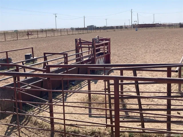 a view of a balcony with wooden floor