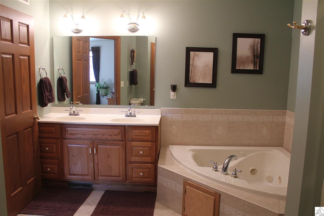 3978 Lavaque Road Hermantown, MN 55811 - Photo 11 of 17 Private master bathroom with walk-in shower and jet tub