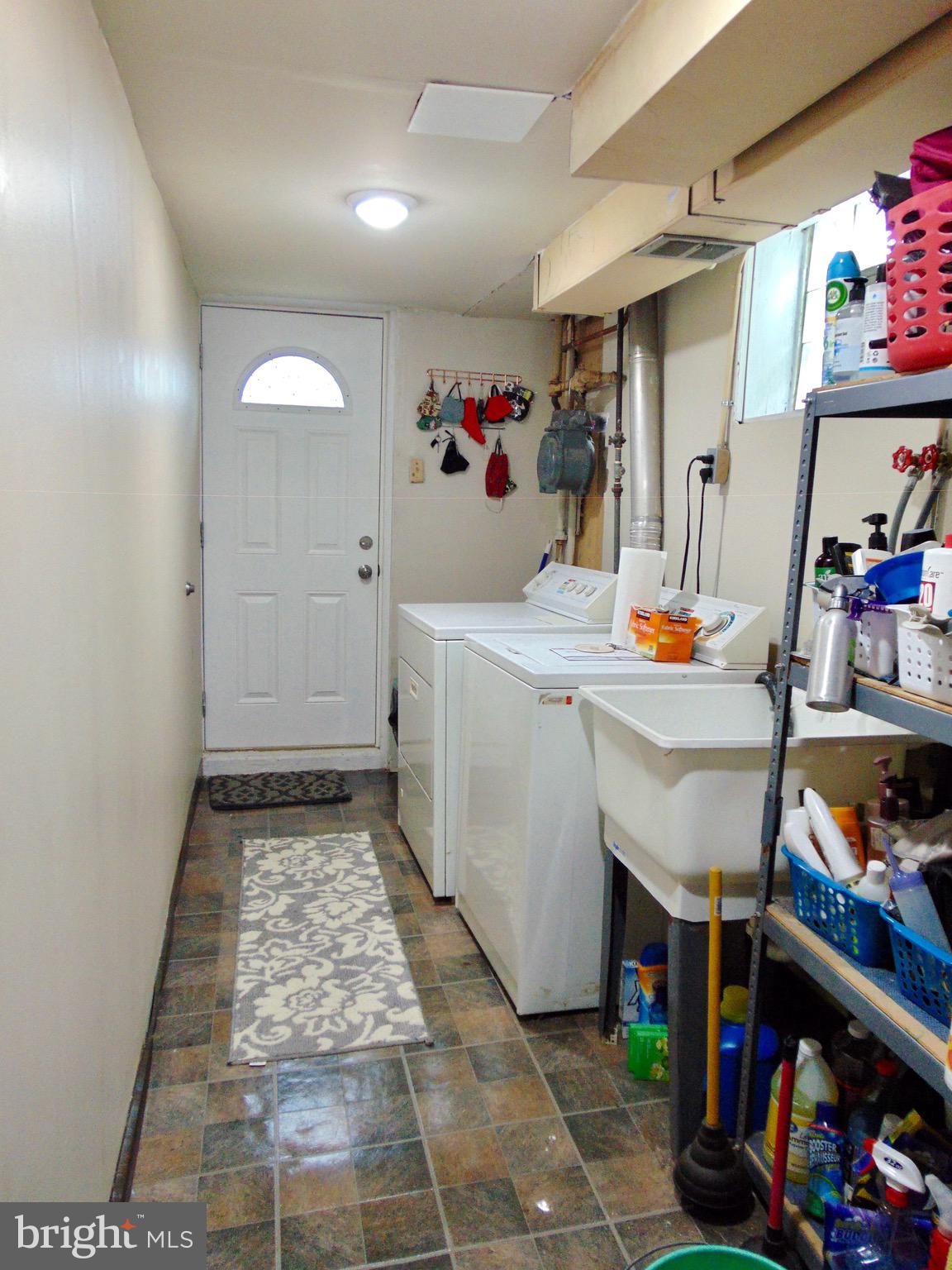 746 Selmer Road Philadelphia, PA 19116 - Photo 25 of 28 laundry area with driveway access