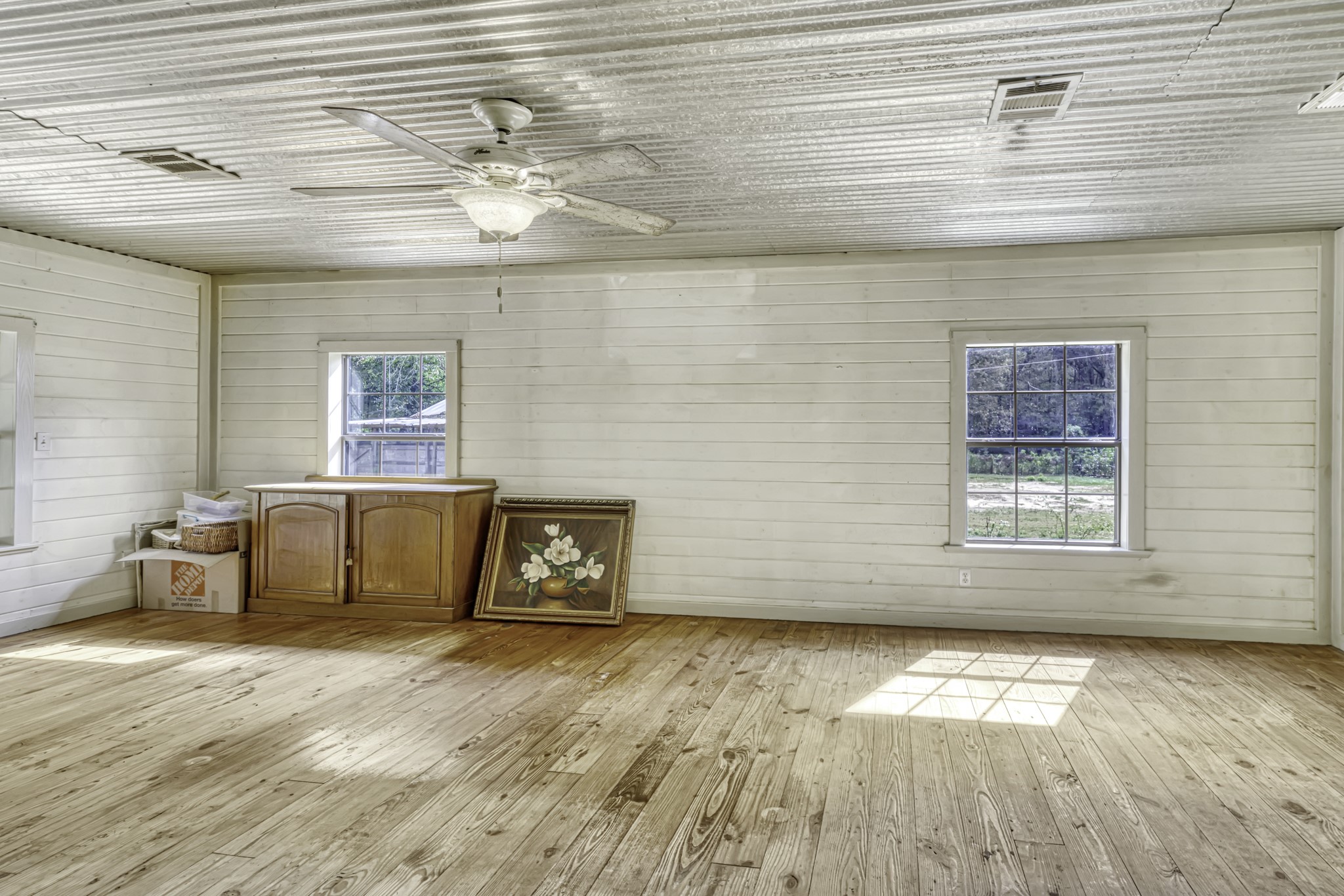 23405 Martha Williams Road Montgomery, TX 77356 - Photo 17 of 45 a view of empty room with wooden floor and fan
