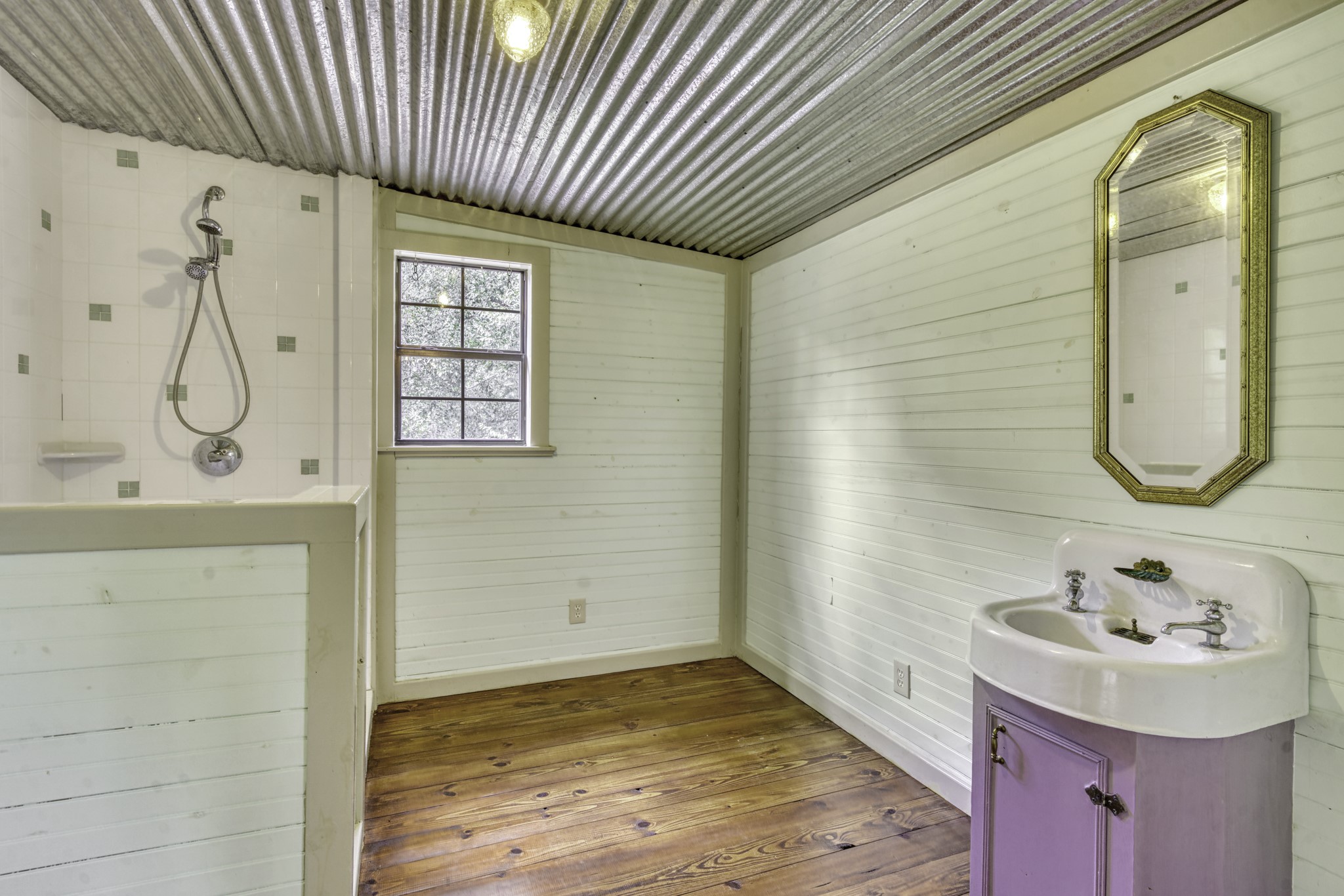 23405 Martha Williams Road Montgomery, TX 77356 - Photo 27 of 45 a bathroom with a sink and a mirror