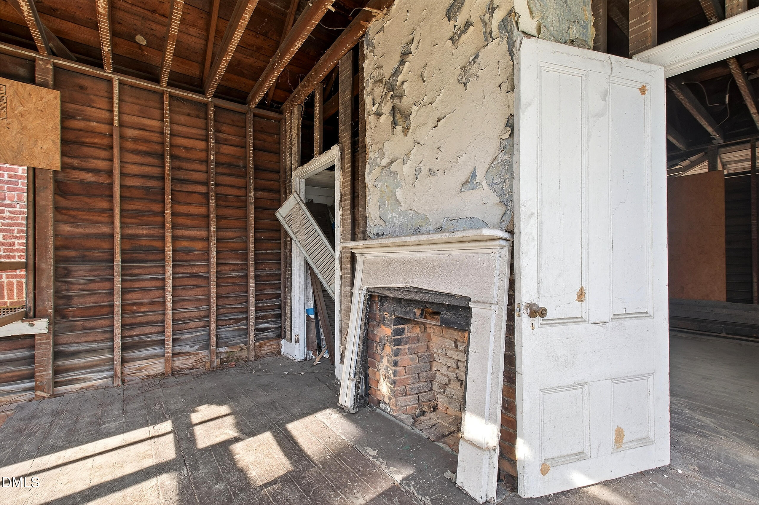316 East Cabarrus Street Raleigh, NC 27601 - Photo 12 of 20 a view of a fireplace with wooden floor