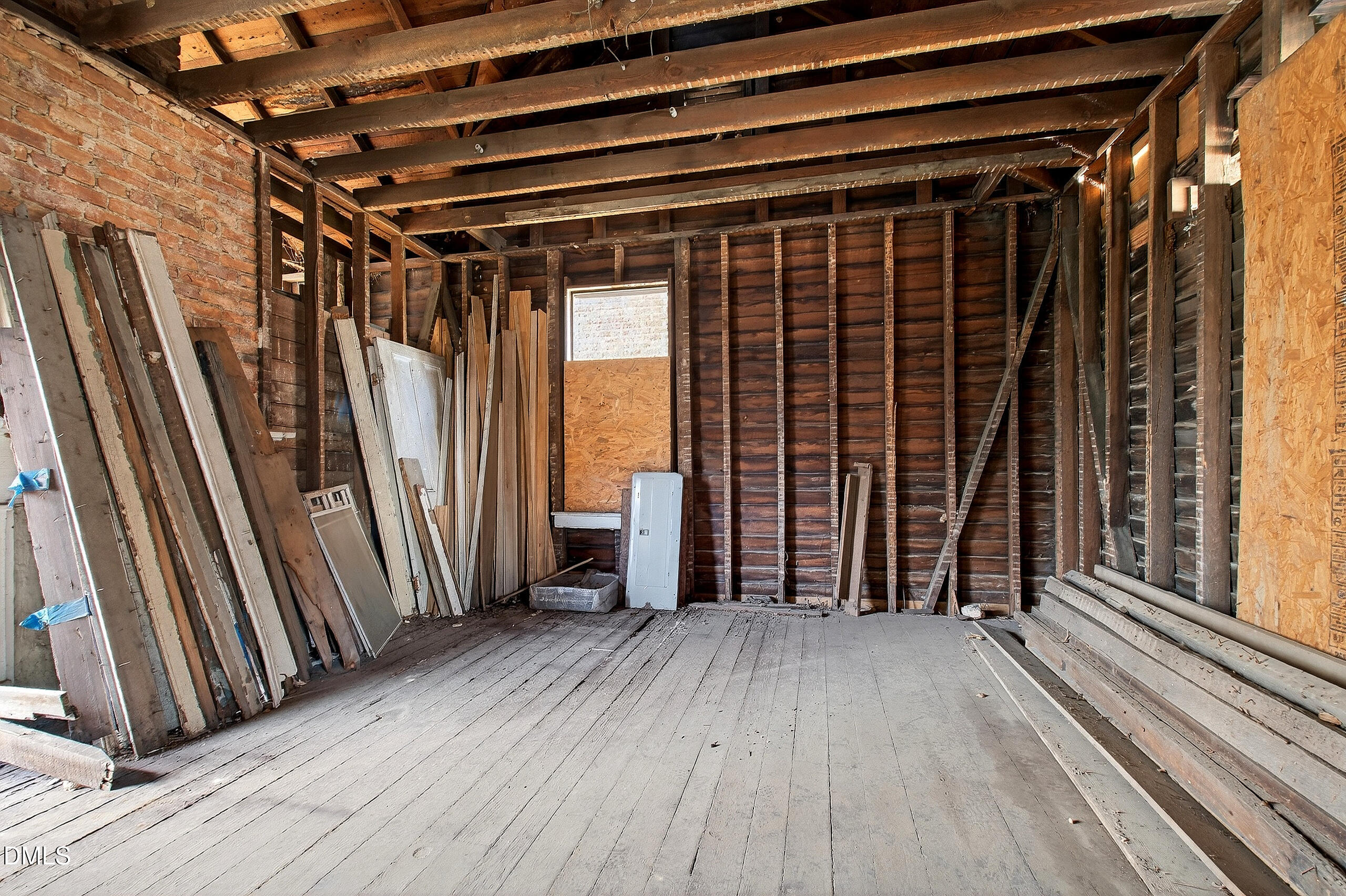 316 East Cabarrus Street Raleigh, NC 27601 - Photo 5 of 20 a view of a room with wooden floor and windows