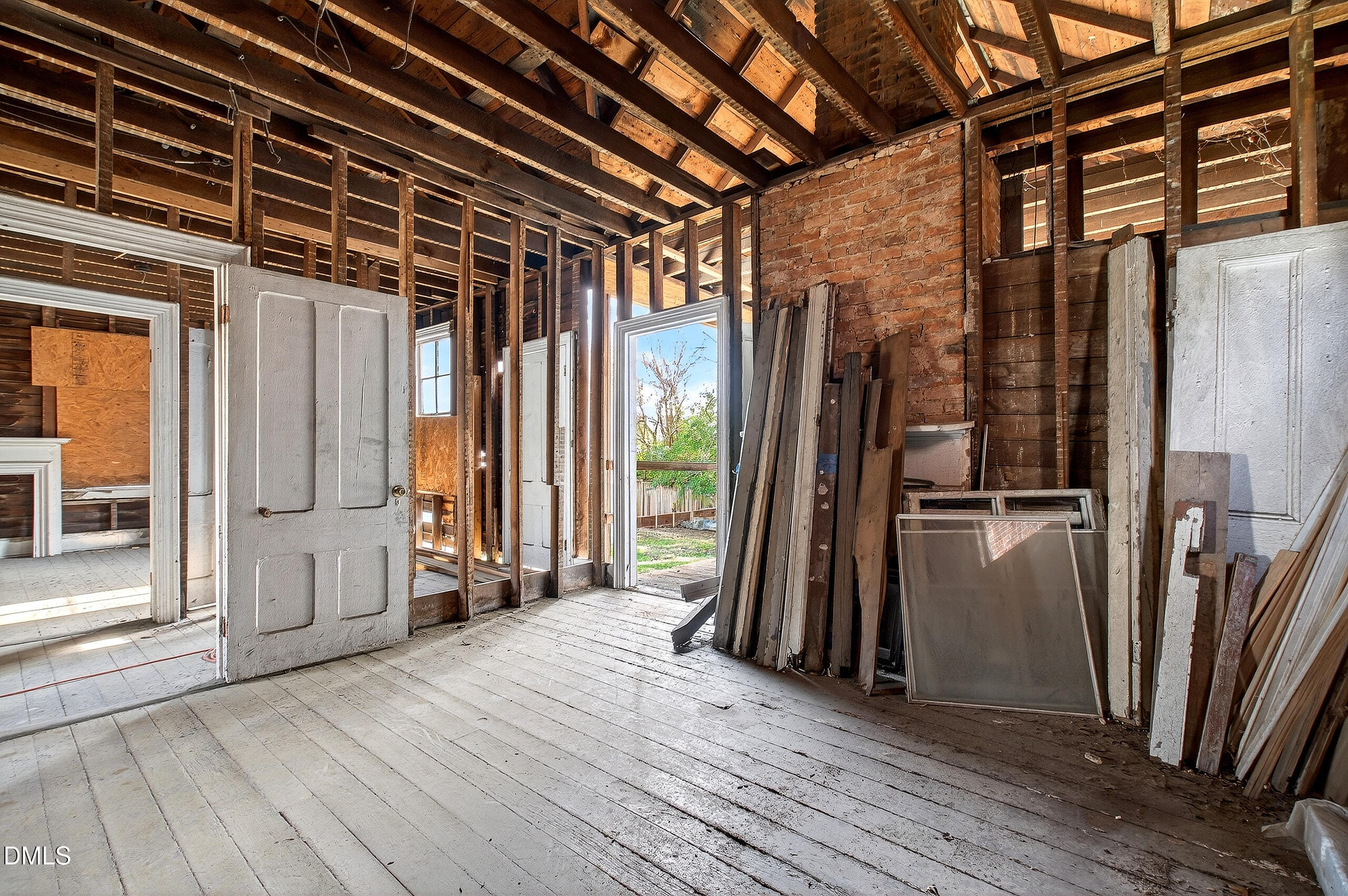 316 East Cabarrus Street Raleigh, NC 27601 - Photo 6 of 20 a view of a porch with wooden floor and stairs