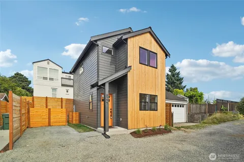 front view of a house with a garage