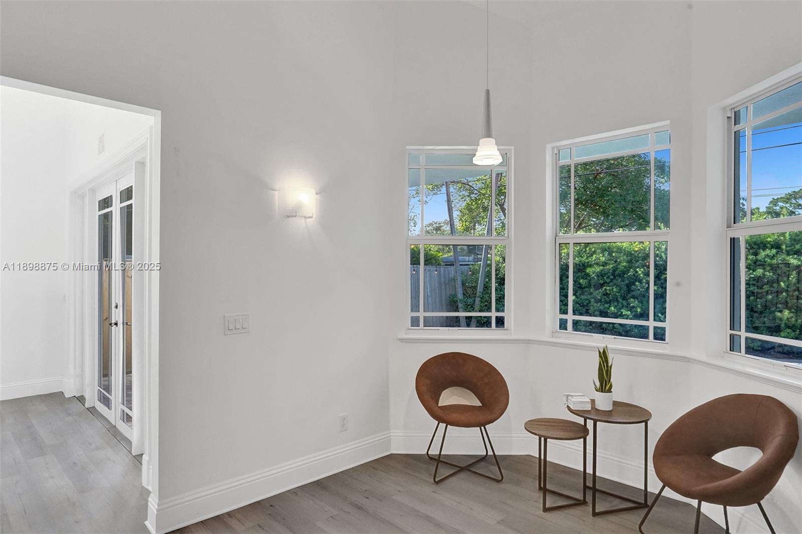 1207 Southwest 21st Street Fort Lauderdale, FL 33315 - Photo 13 of 81 a living room with furniture and a window