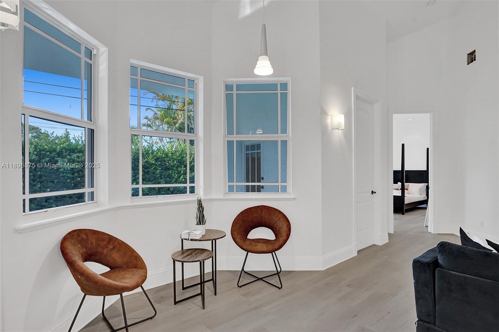 1207 Southwest 21st Street Fort Lauderdale, FL 33315 - Photo 14 of 81 a living room with furniture and a window
