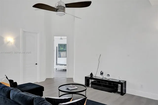 a bedroom with furniture and windows