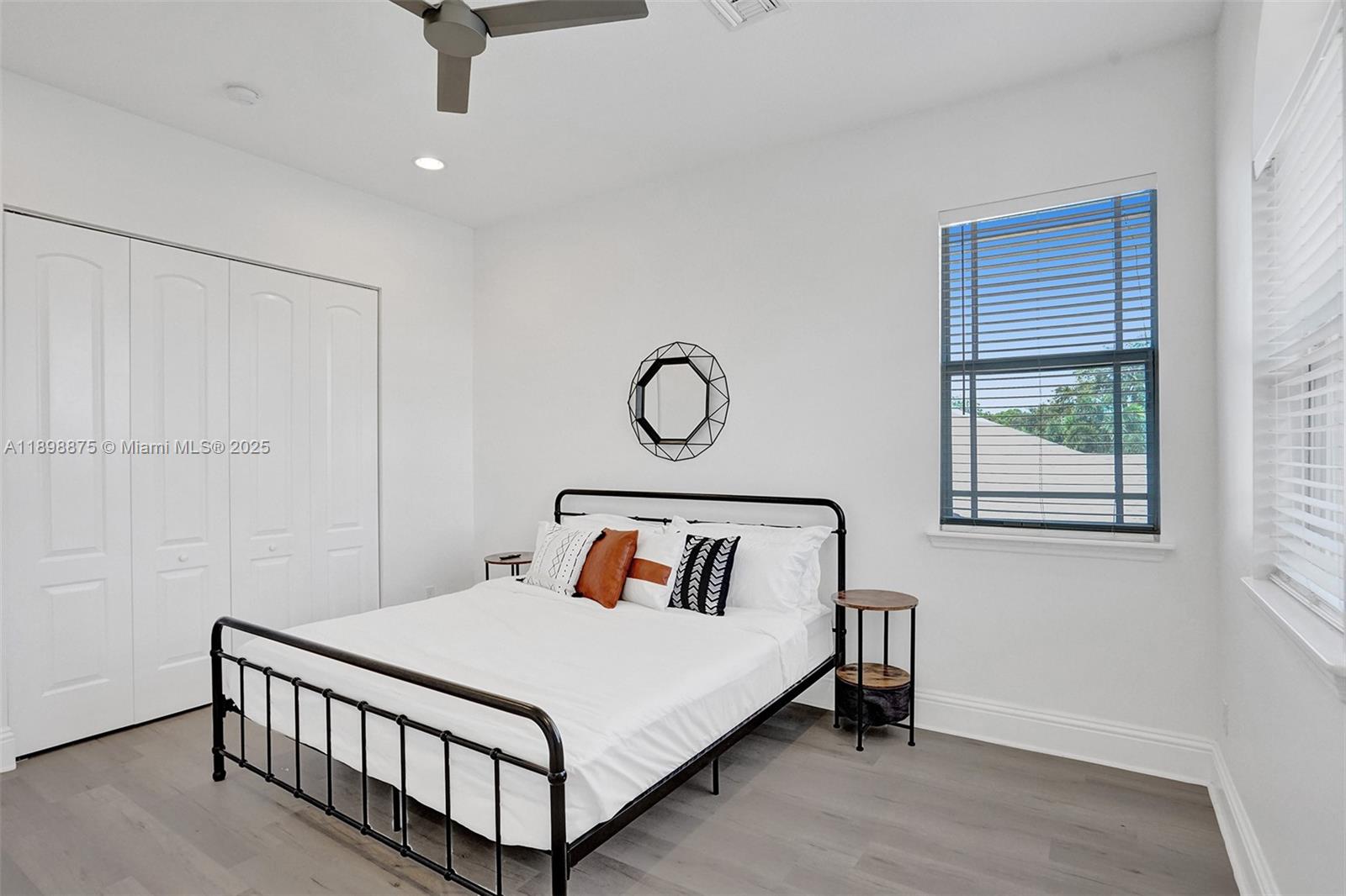 1207 Southwest 21st Street Fort Lauderdale, FL 33315 - Photo 28 of 81 a bedroom with a bed and window