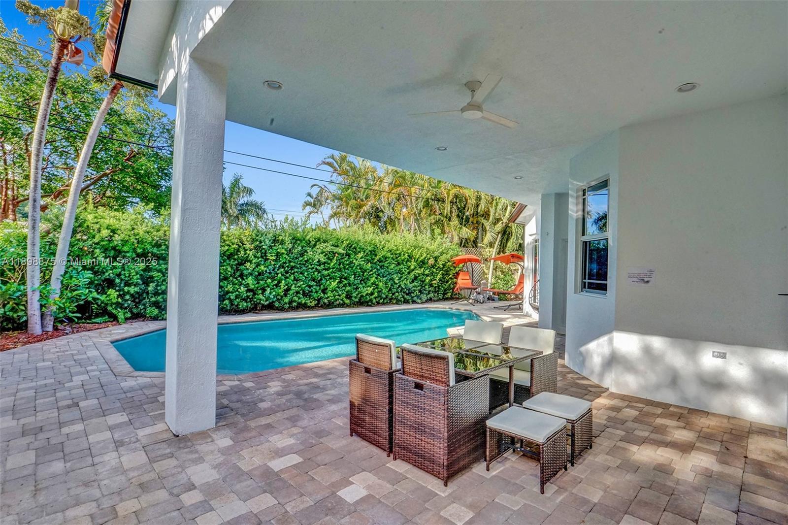 1207 Southwest 21st Street Fort Lauderdale, FL 33315 - Photo 62 of 81 a outdoor living space with furniture and garden view