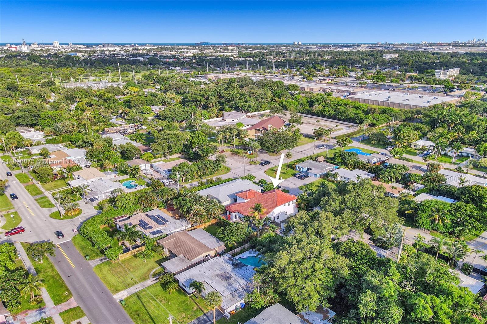 1207 Southwest 21st Street Fort Lauderdale, FL 33315 - Photo 75 of 81 an aerial view of residential houses with outdoor space and trees
