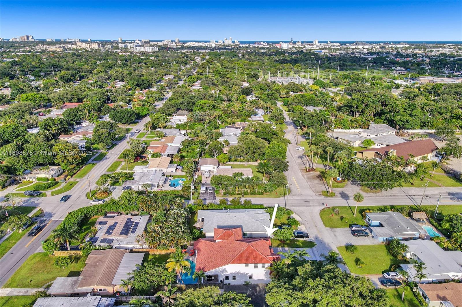 1207 Southwest 21st Street Fort Lauderdale, FL 33315 - Photo 76 of 81 an aerial view of residential houses with outdoor space and trees