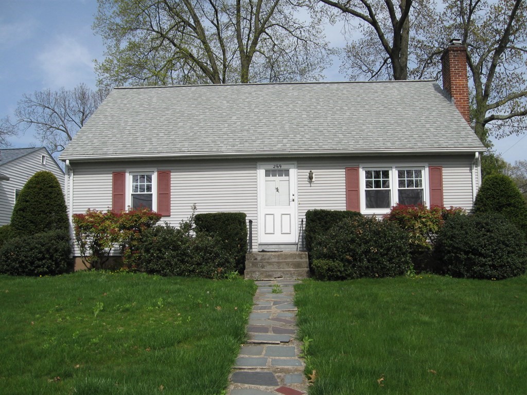 269 West Allen Ridge Road Springfield, MA 01118 - Photo 1 of 25 a front view of house with a garden