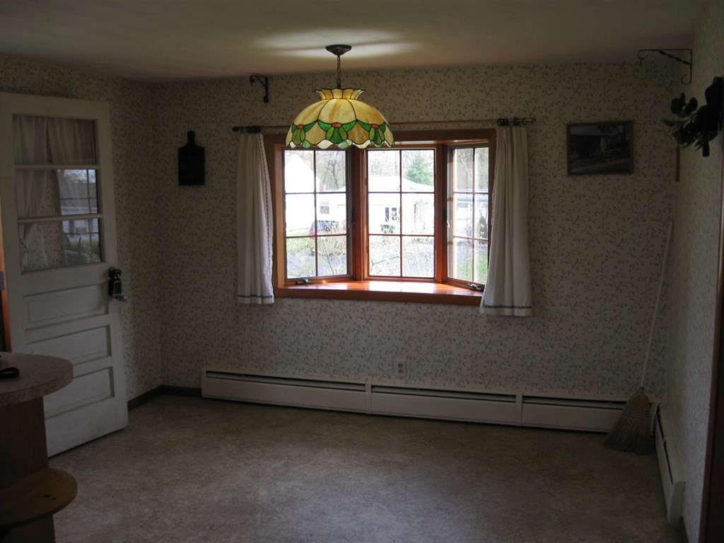 269 West Allen Ridge Road Springfield, MA 01118 - Photo 8 of 25 an empty room with a window