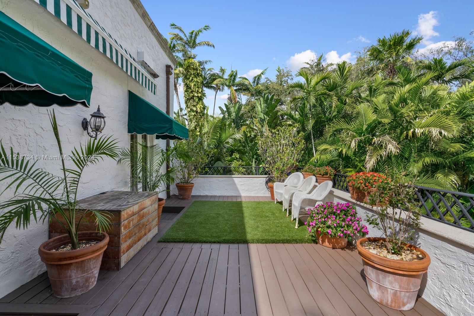 3685 Royal Palm Avenue Miami, FL 33133 - Photo 19 of 41 a view of a backyard with sitting area