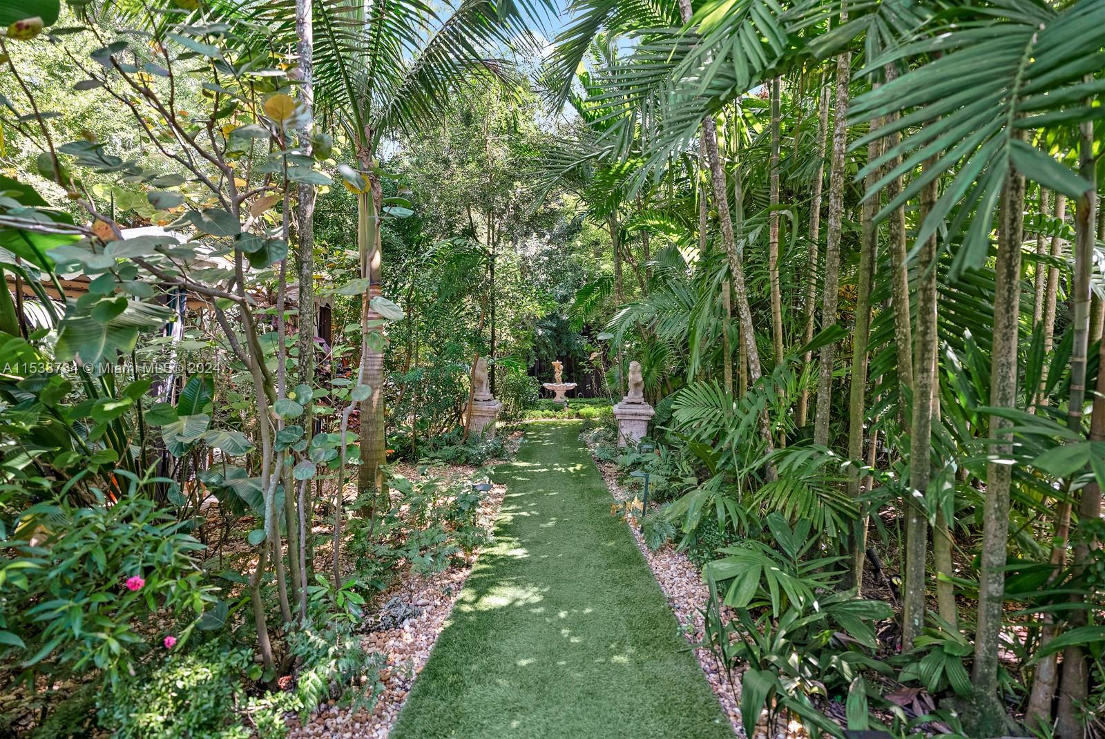 3685 Royal Palm Avenue Miami, FL 33133 - Photo 35 of 41 a view of a garden