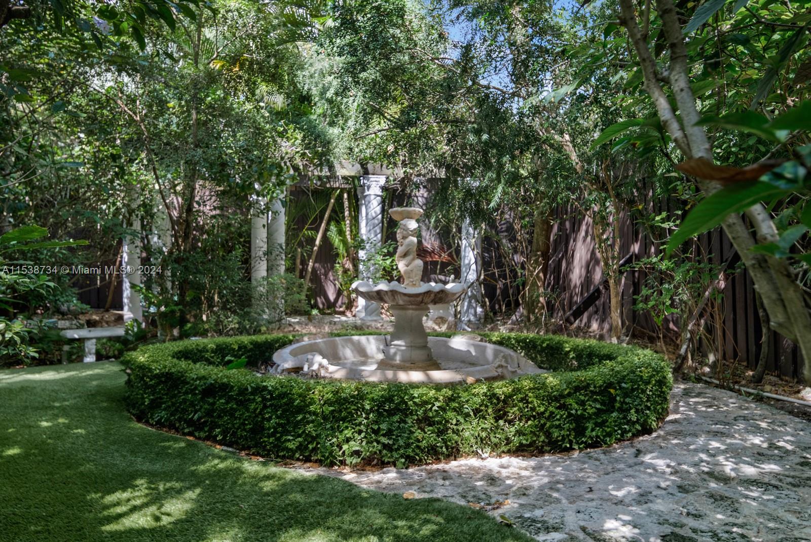 3685 Royal Palm Avenue Miami, FL 33133 - Photo 36 of 41 a view of a park with large trees