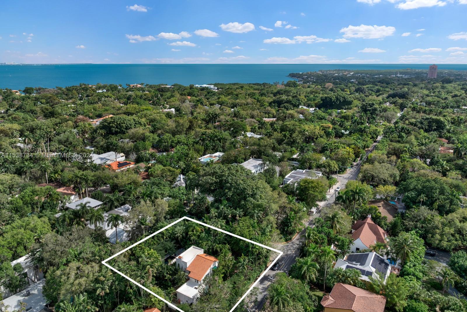 3685 Royal Palm Avenue Miami, FL 33133 - Photo 39 of 41 an aerial view of a residential houses with outdoor space and swimming pool