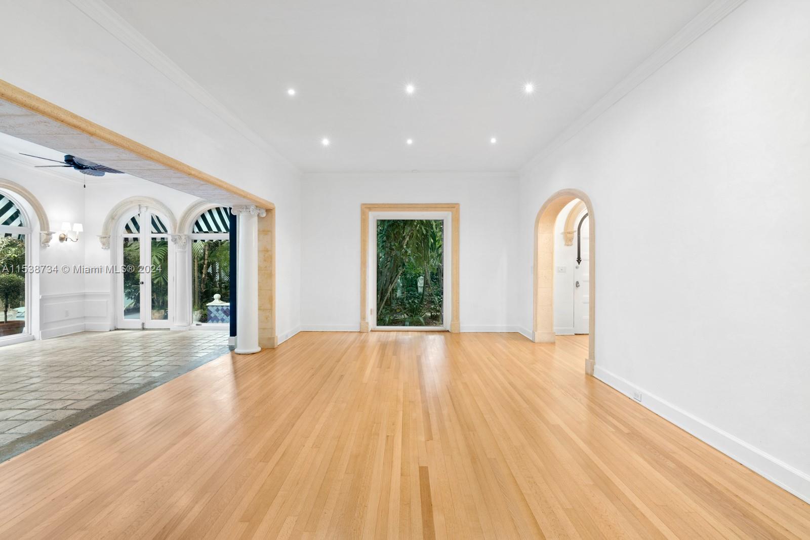 3685 Royal Palm Avenue Miami, FL 33133 - Photo 7 of 41 a view of an entryway with wooden floor